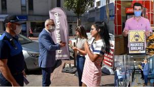 ALİAĞA ZABITASI İŞLETMELERE 'MASKESİZ GİRİLMEZ' AFİŞLERİ DAĞITTI